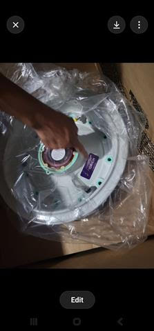 One of the offered A320-family nose-wheel assemblies preserved in an open factory carton
