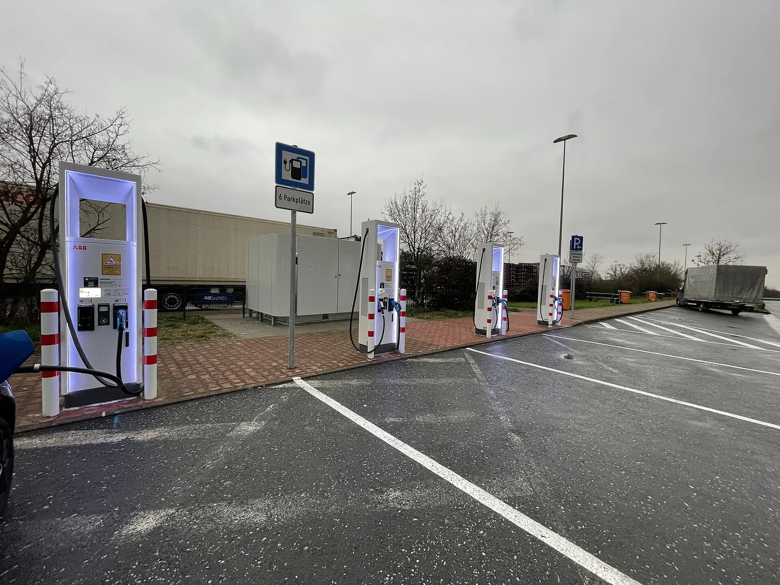 ABB Terra HP charge posts and separate power cabinets at a high-power charging installation