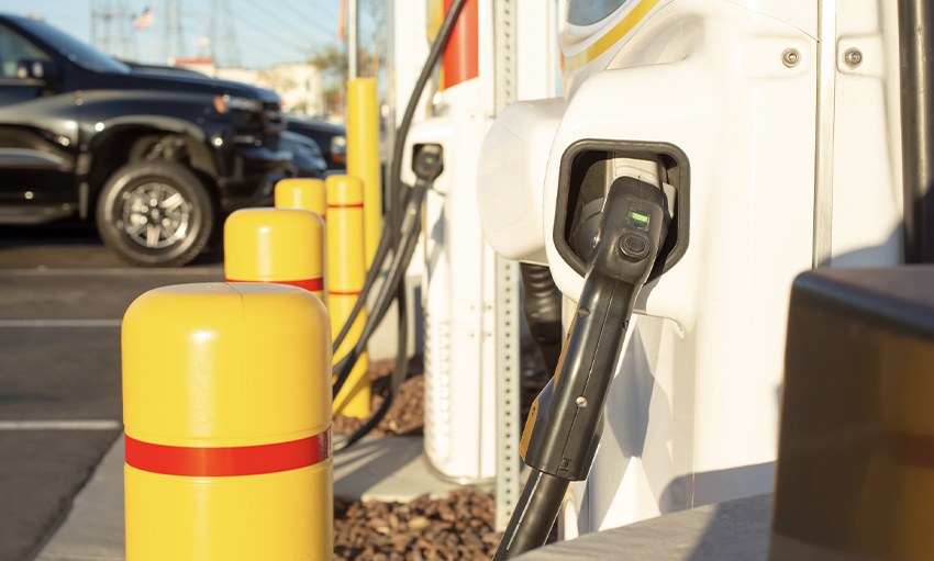 Electric vehicle connected to BTC Power charging equipment at a retail installation