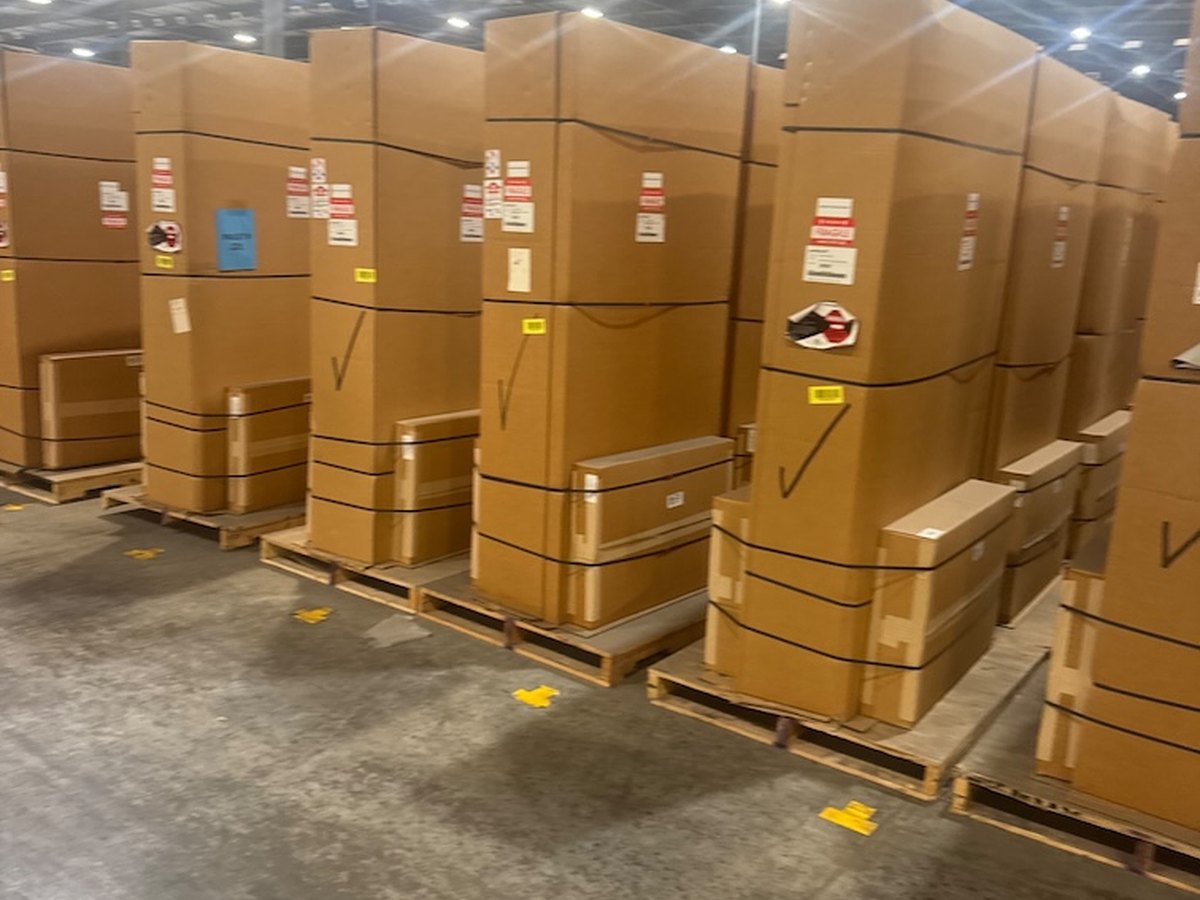 Palletized BTC Power equipment in warehouse