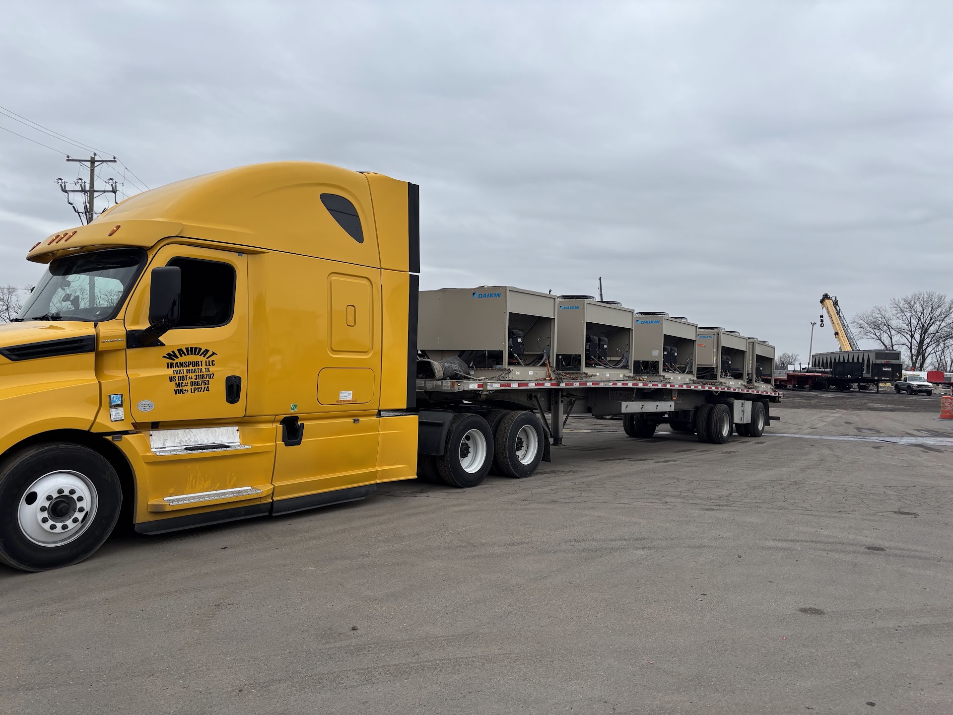 Daikin condensing units loaded on a flatbed trailer