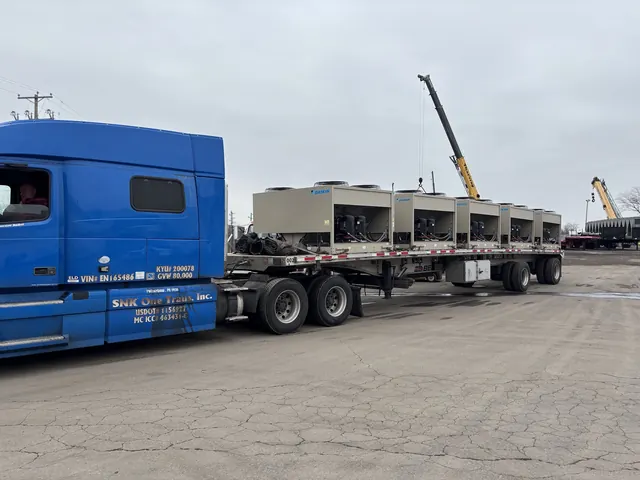 Daikin condensing units secured to a flatbed trailer