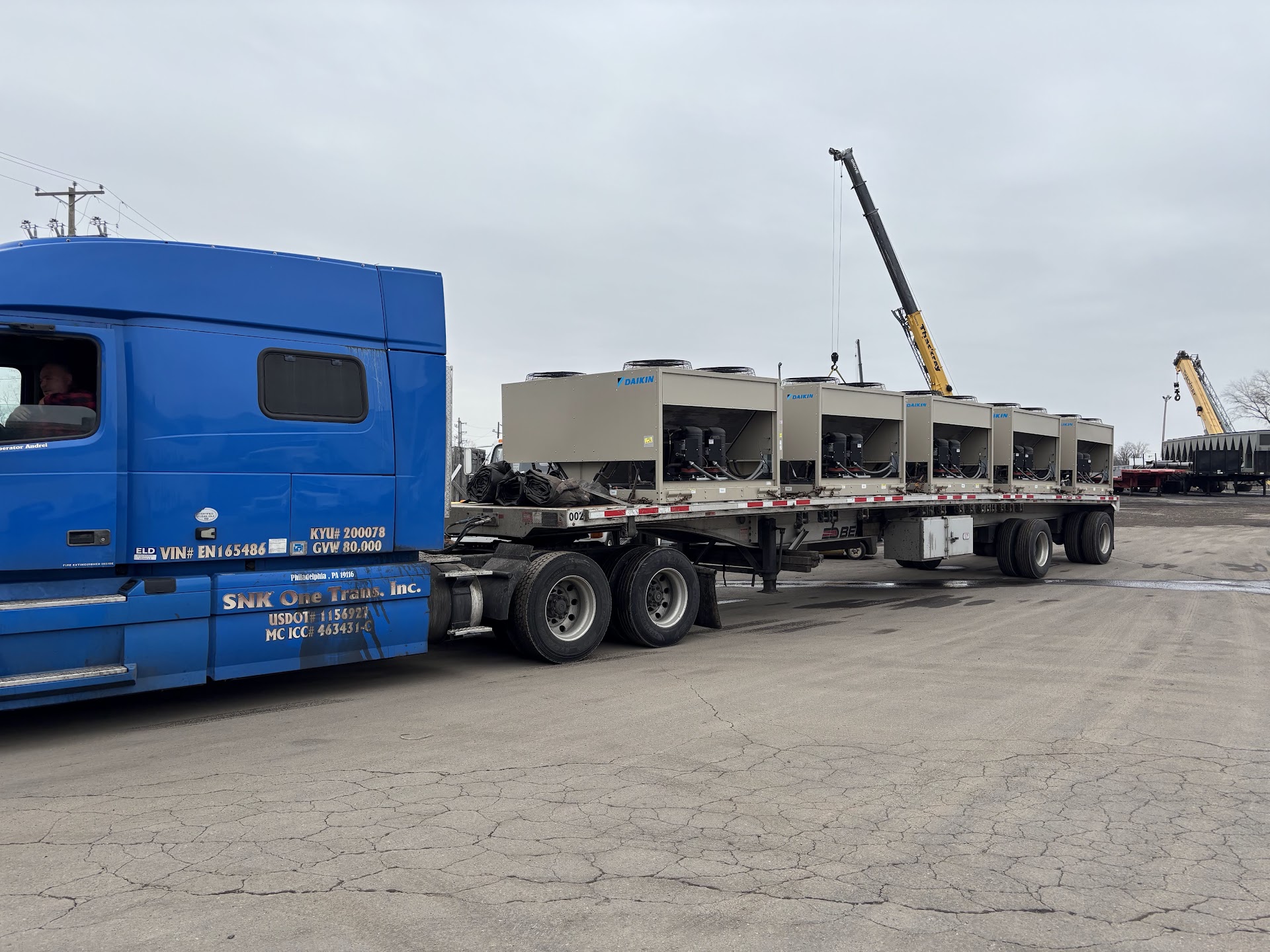 Daikin condensing units secured to a flatbed trailer