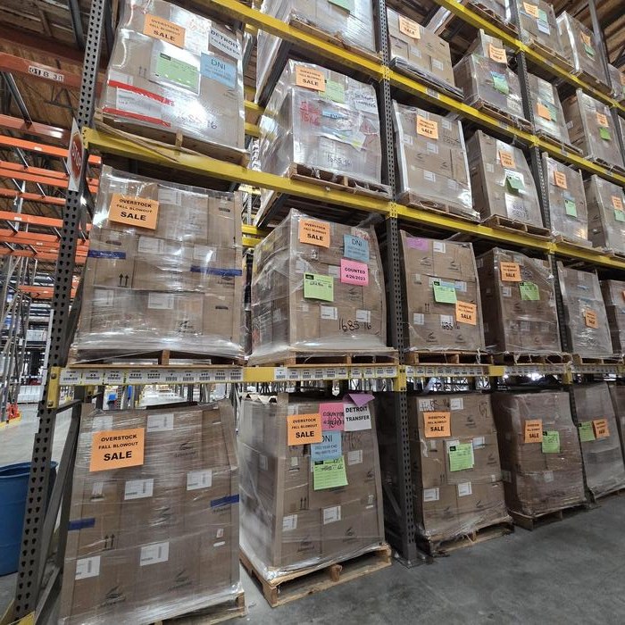 Wrapped pallets of bulk liquid nutrient formats in warehouse