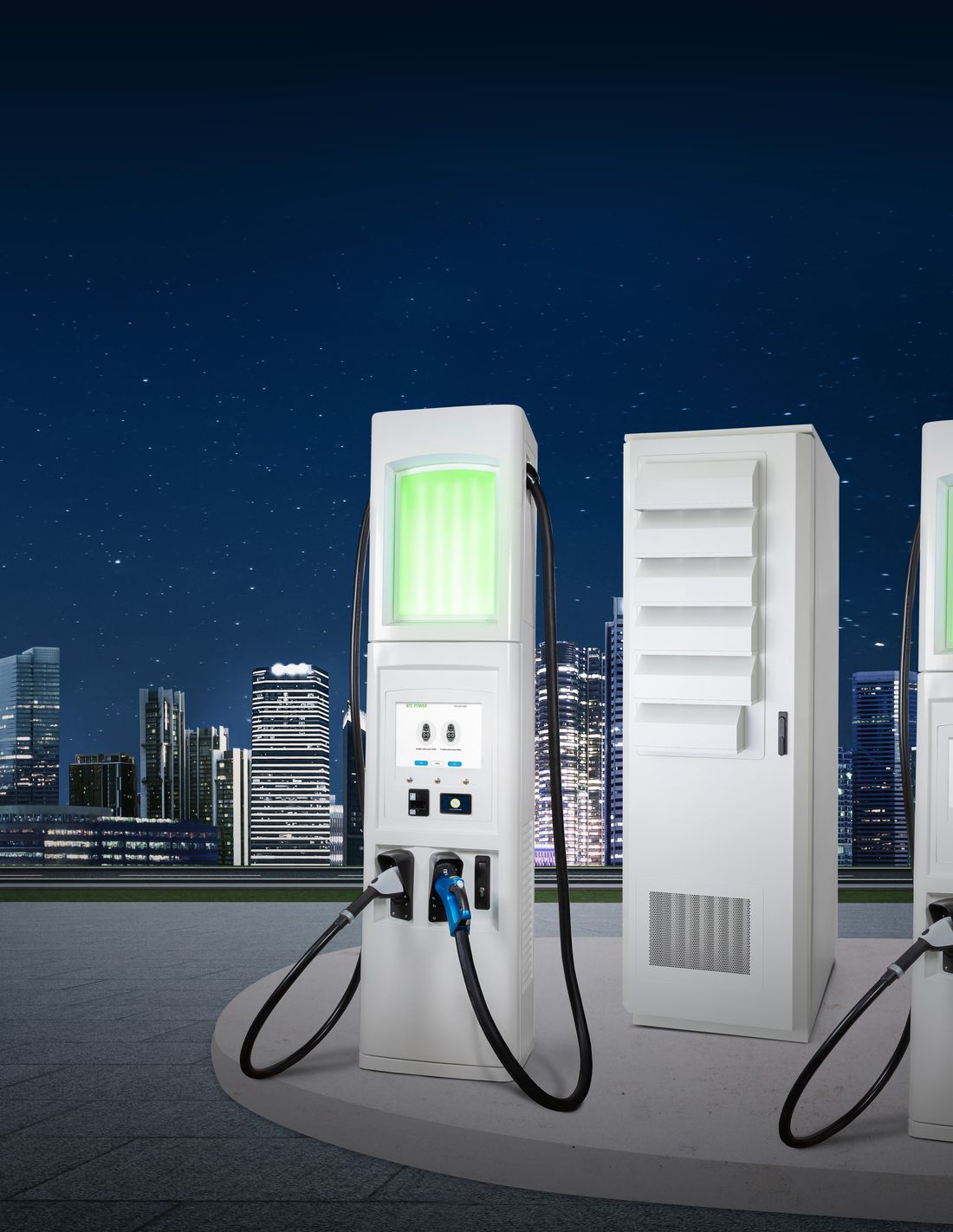 BTC Power DC fast charging stations with glowing displays at night